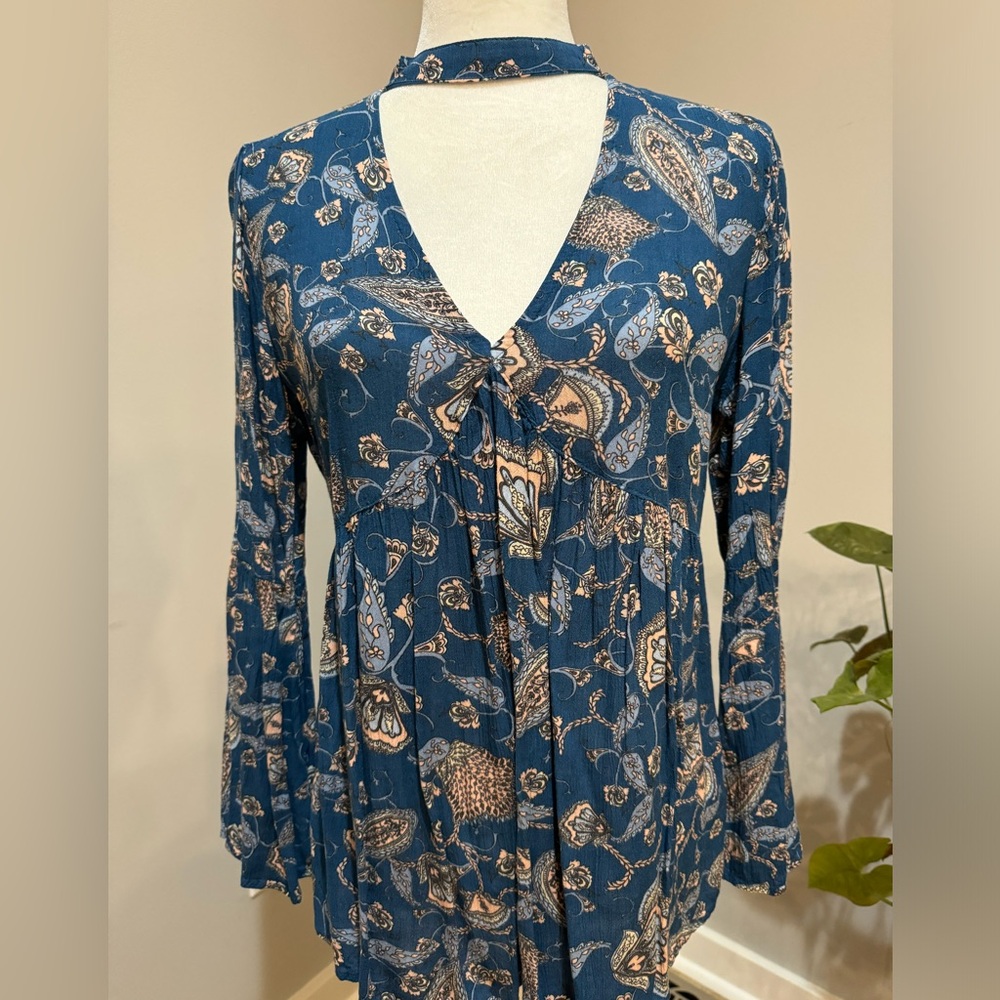 Adorable teal blue, paisley long sleeve top.  Size small.